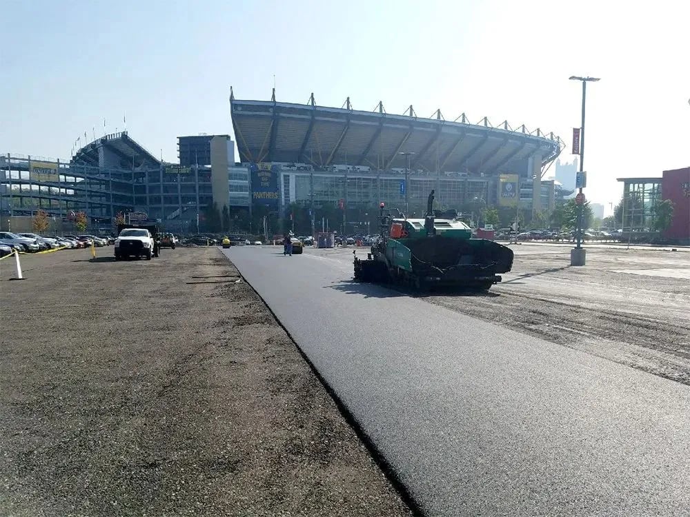 Large-scale commercial asphalt paving job in progress
