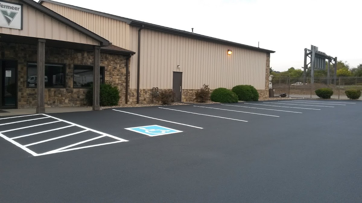 Commercial parking lot with fresh line striping including an ADA-compliant space